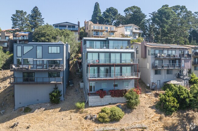 Newer homes in Forestland have large windows, big decks, and and modern designs.