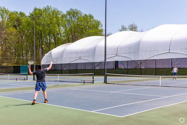 Meet up with friends for a game of tennis at Wheaton Regional Park.