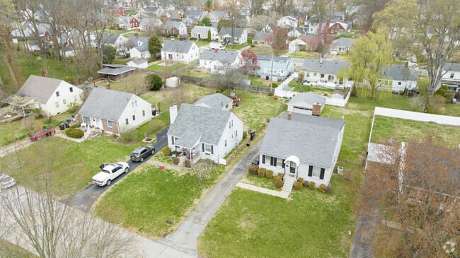 Many houses in the Springlee Neighborhood have long driveways leading to detached garages.