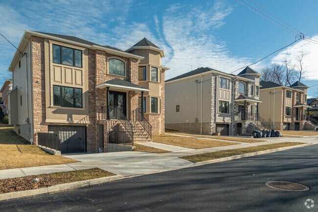 Most properties in Richmond Town have attached garages.
