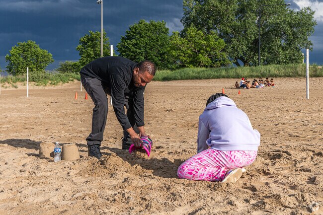 Families flock to 63rd Street Beach to spend quality time together.