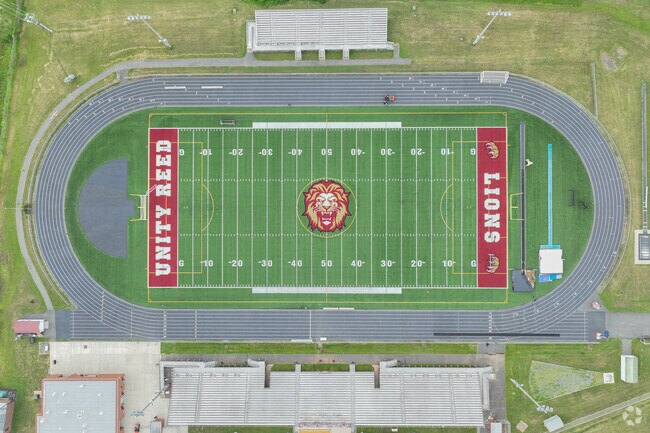 Unity Reed High School has an excellent athletics program near Independence neighborhood.