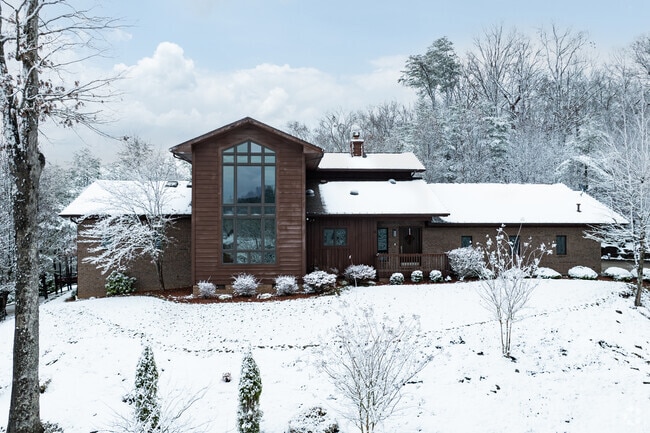 Large, custom homes are located along winding roads in Pea Ridge.