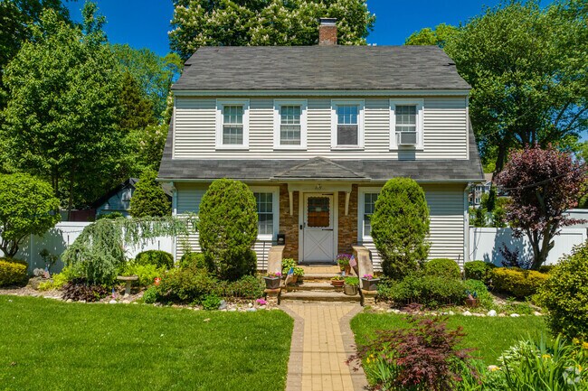 This Colonial in Huntington Station has loads of charm.