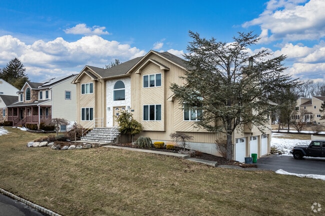 Larger, newer homes and smaller townhouses are scattered throughout the New City community.