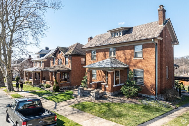 Three distinct takes on brick craftsman homes sit side by side in Wilson.