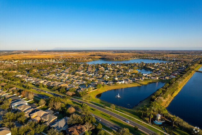 Scenic lake views can be had from your backyard, especially during sunset, in Lee Vista.