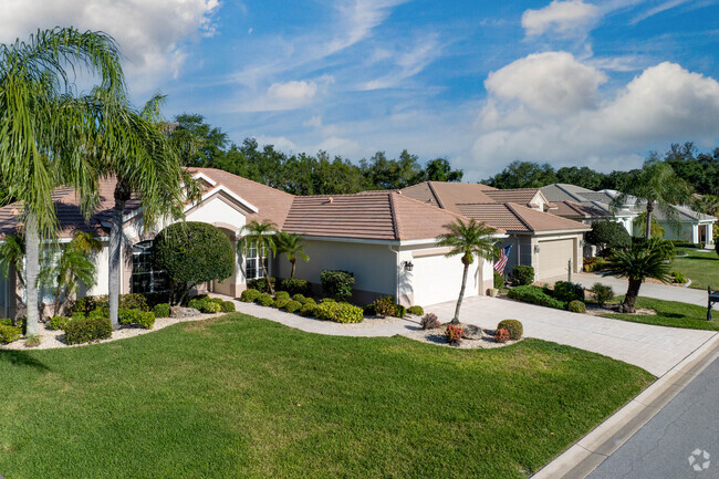 Pelican Pointe lawns are sprinkled with palms, providing a Floridian feel to the community.