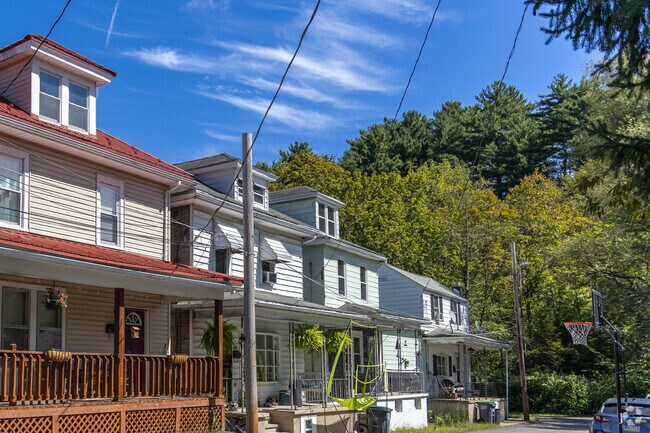 New Philadelphia’s streets are lined with colorful row houses that add charm to the neighborhood.