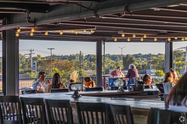 Tavern in the Square in Walnut Hill offers a rooftop with a view.