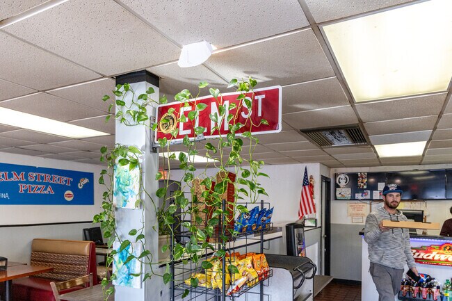 Elm Street Pizza is known for its classic Italian grinders and specialty pies.