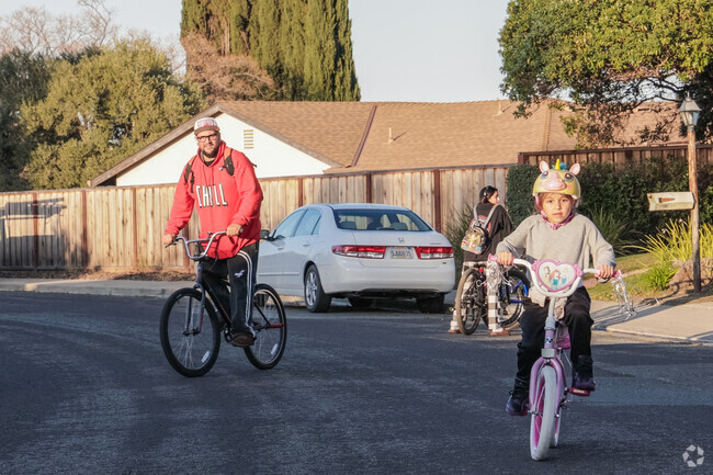 Cycling duo Man and daughter explore Meadowbrook together.