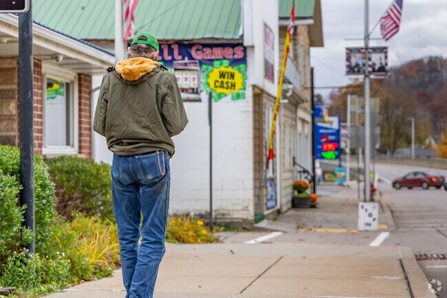 A Redbank Township resident takes an afternoon walk down the streets of New Salem.