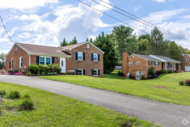 Streets in Maple Hills are lined with split-level homes.