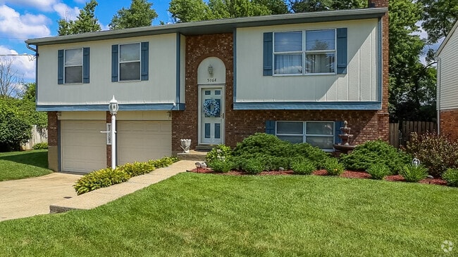 The '70s brought bi-levels with attached garages to Delhi Hills.