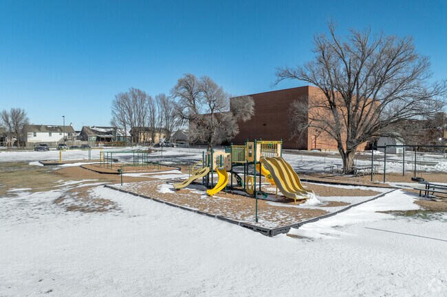 Kids can climb on the playground at Oatville Elementary School.