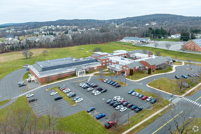 Ellington Middle School has 411 students enrolled.