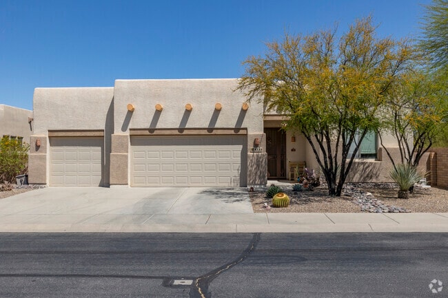 Pueblo Revival homes have two or three car garages in Continental Reserve.