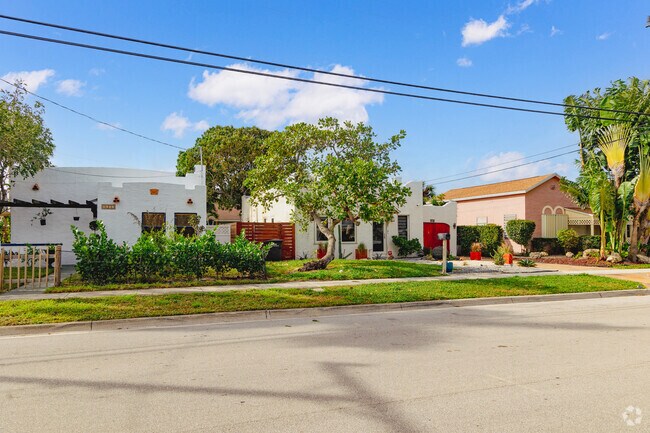 Charming homes with lush greenery line the serene streets of South End.