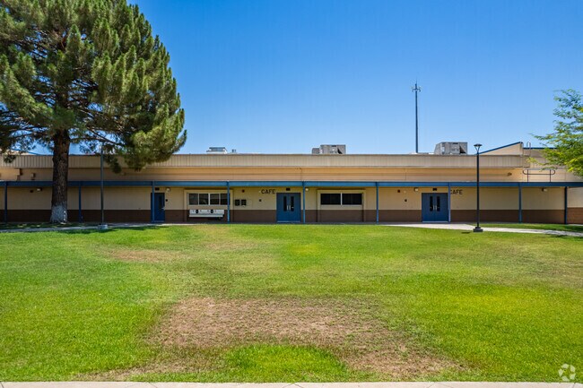 Enjoy outdoor activities on the open field of Richard E Miller School in Phoenix.