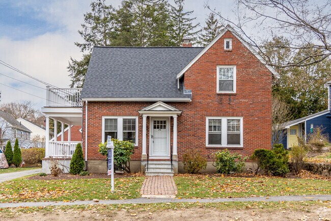 Colonial home with private driveway and double balcony in Cedarwood.