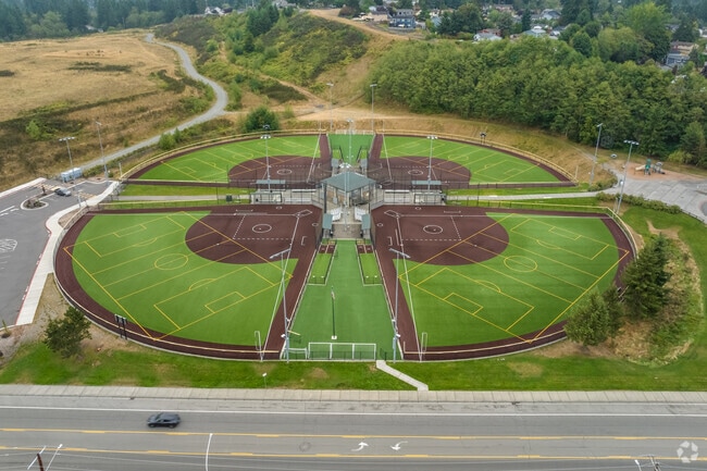 Evergreen ball enthusiasts flock to Phil Johnson Ballfields to enjoy a game of softball.