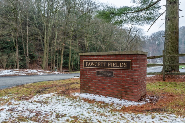 Fawcett Fields is a multi-use park with soccer fields, walking path, and a stream.