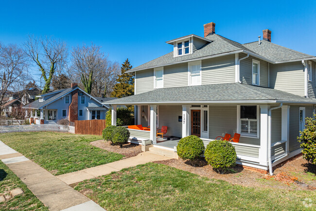 Nicely manicured lawns adorn 2-story homes in Sunnyside.