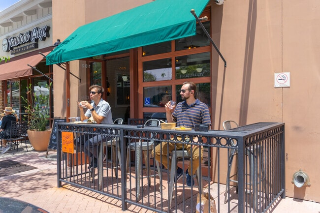 Sit outside and enjoy lunch at the many restaurants nearby.
