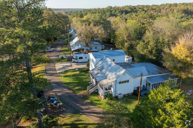 Homes in Juliette are often set back and shaded by the Georgian trees.