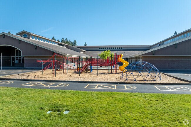 High Lakes Elementary School has a playground for kids to enjoy in the Summit West neighborhood.