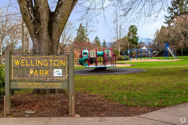 Wellington Park greets Roseway with open lawns and shady paths.