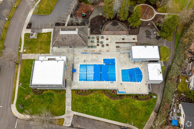 The Oak Hills Recreation Center features a pool, playgrounds, sports courts, and hosts a variety of community activities.