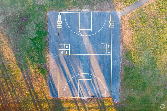 Kids can shoot hoops or play four square during recess at North East Elementary School.