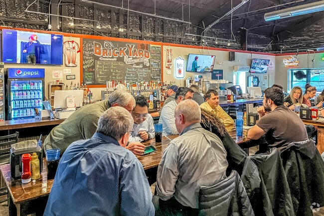 Families, friends, and coworkers gather for drinks and hearty meals.