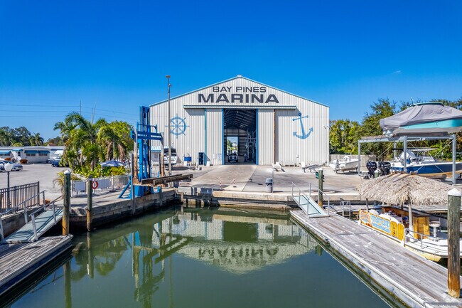 Locals store their boats at Bay Pines Marina within the community.