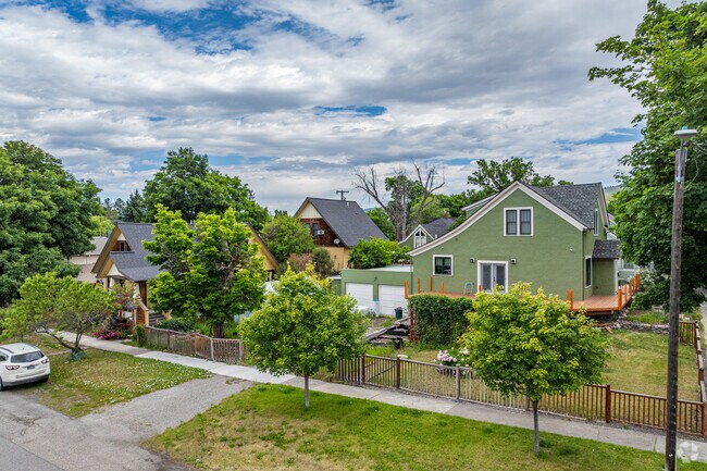 Established craftsman homes enjoy mature trees and large lots.