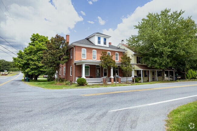 Albany homes sit along quiet country roads, with prices typically ranging from $250k to $450k.