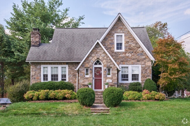 Purcellville feature cozy stone cottage-style home with timeless character.