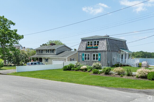 Gorgeous colonial style water view homes in Moriches.