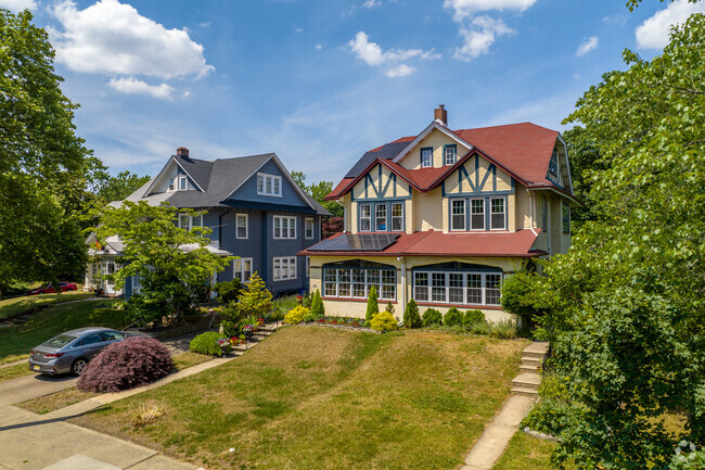 Some twin home duplexes come with private driveways and small front yards.