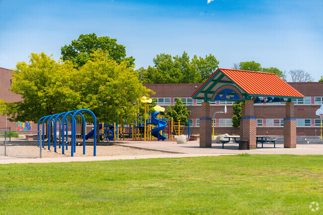 Ellis Elementary School is a public pre-K and elementary school has a shaded eating area.
