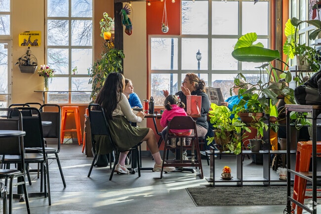 Enjoy a conversation with friends at La Finca Coffeehouse in Saint Francis.