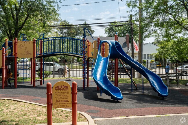 Your kids will never want to leave the playground at Cedar Street Park.