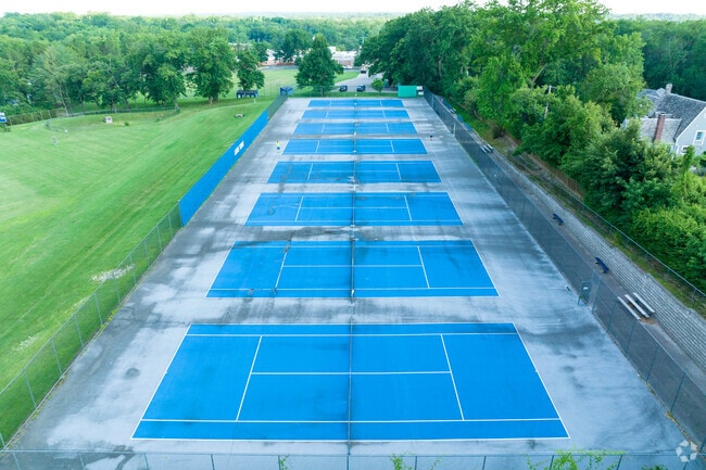 Student-athletes train at the tennis courts at Ladue Middle School.