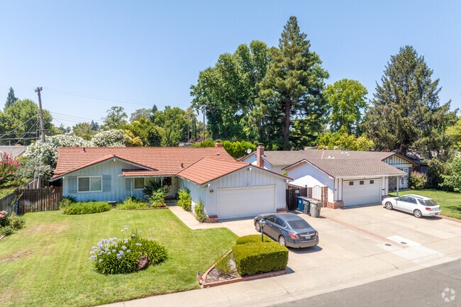 A pair of homes with a two-car garage in the College Glen neighborhood.