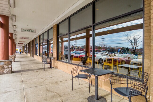 Sit Outside and Enjoy a Cup of Coffee at the Neighborhood Starbucks in the  Hillandale Shopping Center