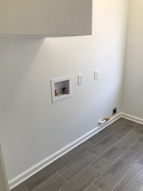 Laundry room with gas and electric washer and drier hookups