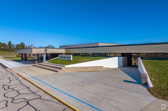 Central Middle School with its low earth built design.