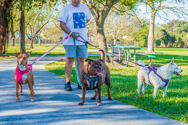 Residents of Lindgren, FL, enjoy their day out with their furry friends.